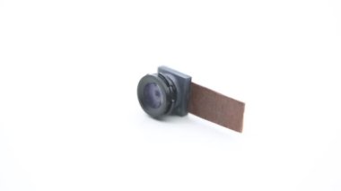 Cep telefonu için kamera modülüne yaklaş. Smartphone Lens 'in beyaz arkaplanlı stüdyo çekimleri.