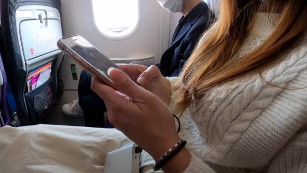 Asian Woman Holding Smartphone Flight Trip Traveller Sit Plane Using — Stock Video