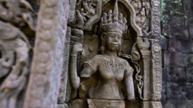 4K, Preah Khan 'da oyulmuş yapılar. Antik oymalar dünya mirası alanı Angkor Thom 'un tapınak duvarlarını süslüyor. Khmer İmparatorluğu 'nun inşası için taş heykel. Kamboçya harabeleri.