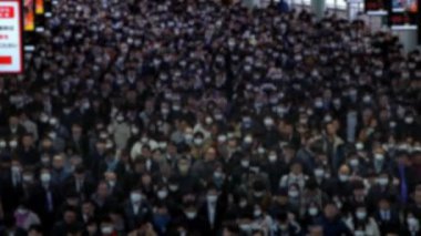 4K, yüksek açı görüşünün bulanık görüntüsü metroda yürürken cerrahi maske takan kalabalık. Coronavirus pnömonisi birçok şehre yayılıyor. 2019-NCoV salgını Çin.