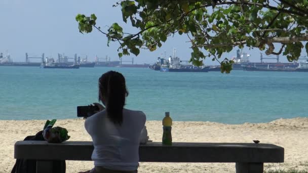 Singapore April 2015 Young Asian Woman Outdoors Sitting Table East — Stock Video