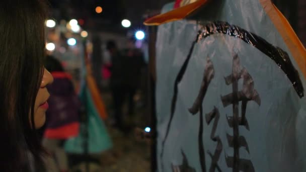 Slow Motion Asian Woman Writting Chinese Words Traditional Lanterns Buddhist — Stock Video