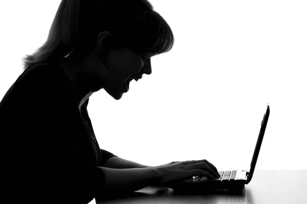 Silhouette of a woman surprised by online discount — Stock Photo, Image