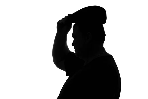 Silhouette of plump man wear a hat with a visor — Stock Photo, Image