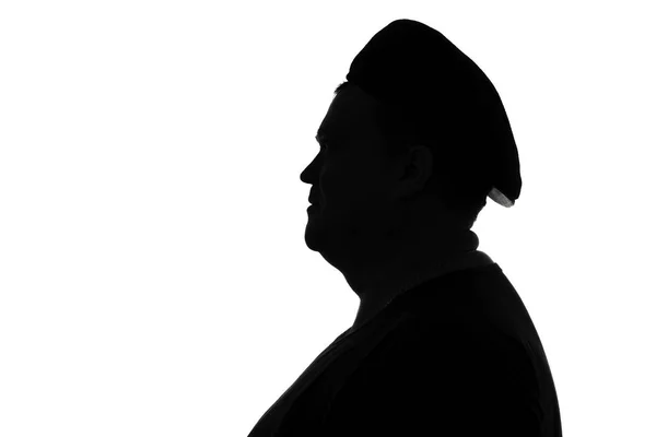 Silhouette of a plump man in a cap — Stock Photo, Image