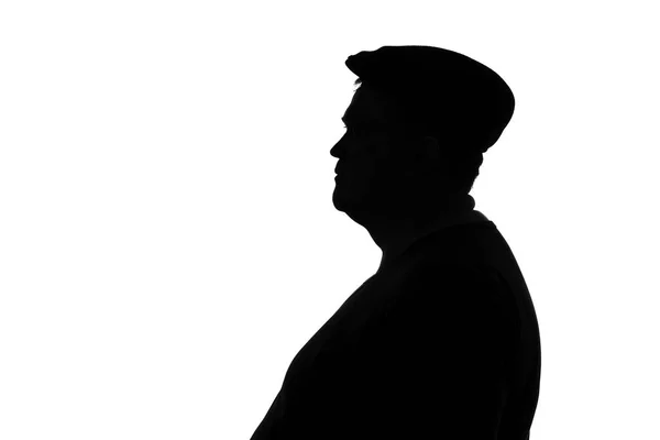 Silhouette of a plump man in a cap — Stock Photo, Image