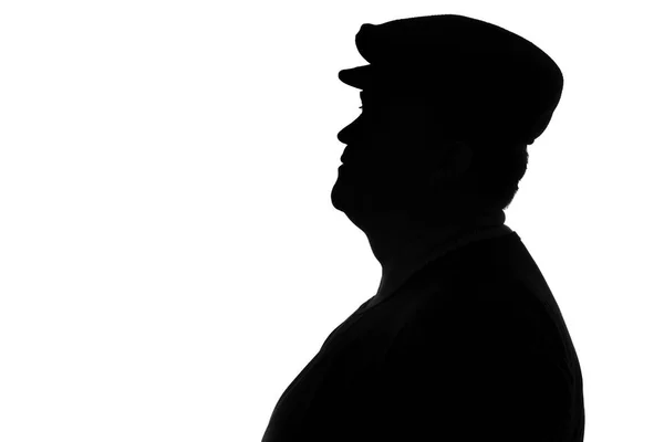 Silhouet van een mollige man in een cap — Stockfoto