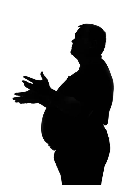 Silhouette d'un homme au ventre de pot tirant ses mains vers le ciel — Photo