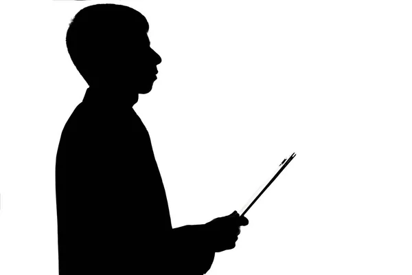 Silhouette of a man with a folder in hands — Stock Photo, Image