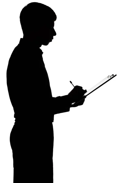 Silhouette of a business man signing a loan — Stock Photo, Image