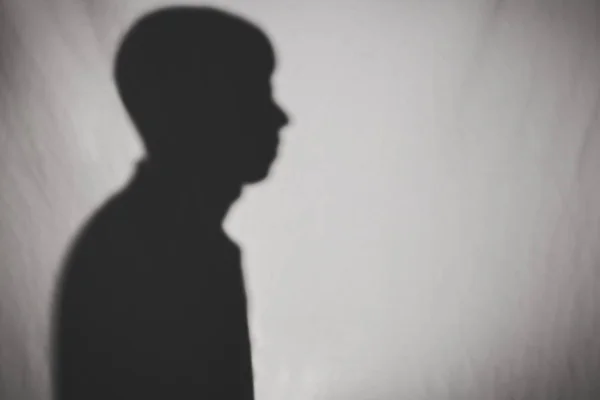 Silhouette of man profile on white texture — Stock Photo, Image