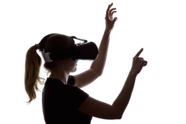 Portrait of a woman working in three-dimensional space in virtual reality clipart
