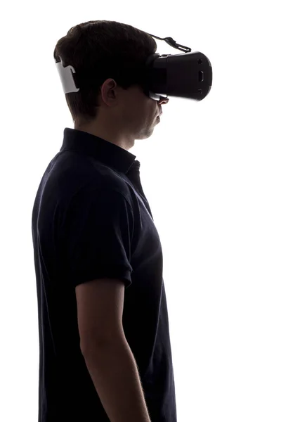 Silhouette profile of man in virtual reality glasses — Stock Photo, Image