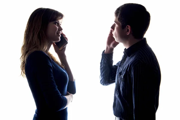 Silhouette of a couple with a problem in relationships — Stock Photo, Image