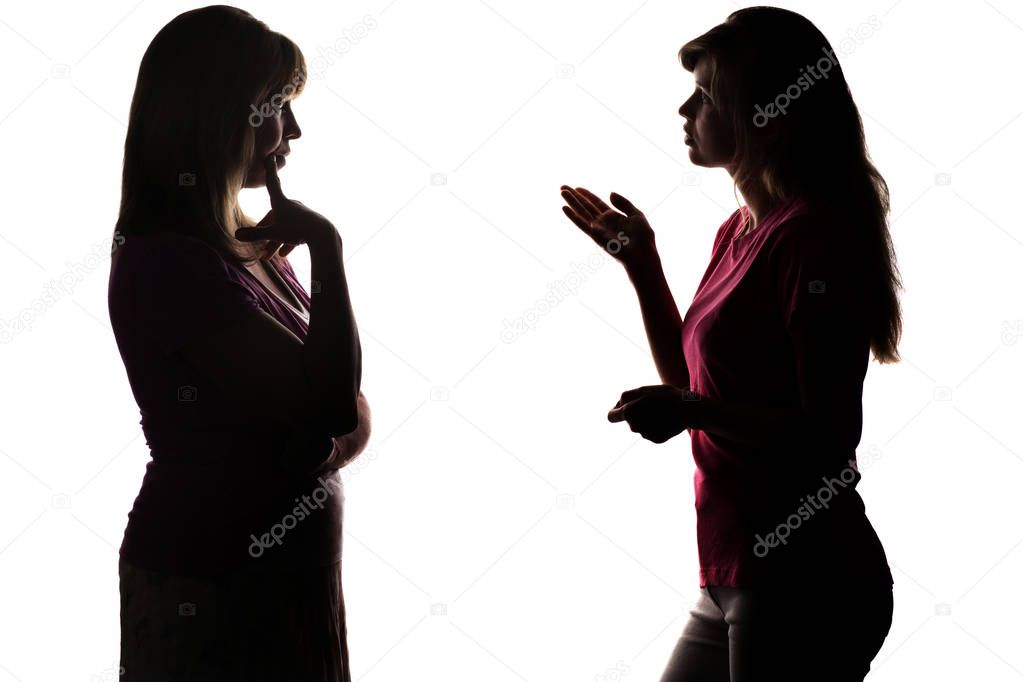 Silhouette mother and daughter dialogue
