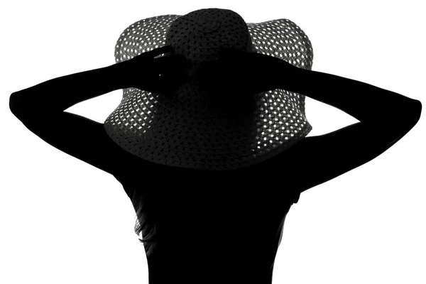 모자를 쓴 여자의 실루엣 — 스톡 사진