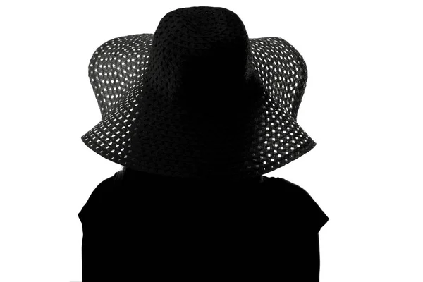 Silhouet van een vrouw met een hoed — Stockfoto