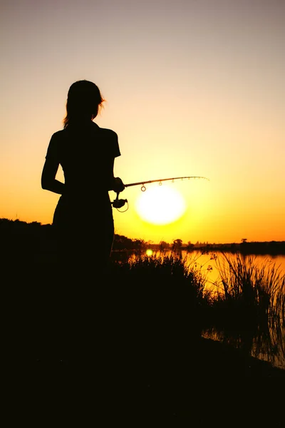 Girl fishing silhouette Stock Photos, Royalty Free Girl fishing silhouette  Images