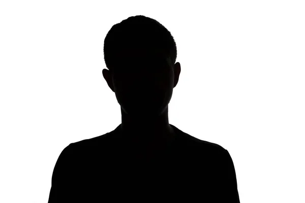 Zwart-wit silhouet van een onbekende jonge man op een witte achtergrond voor geïsoleerde — Stockfoto