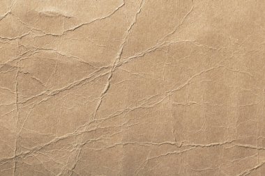 doku ile kıvıran, buruşuk kağıt karton
