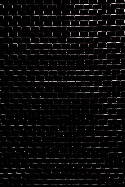 金属メッシュのテクスチャ黒濃い背景素材パターン — ストック写真