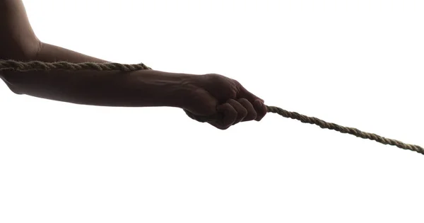 Silhueta Mão Homem Puxando Cabo Corda Guerra Fundo Branco Isolado — Fotografia de Stock