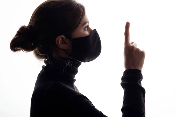 Silhouette Profile Young Woman Protective Mask Showing Finger White Studio — Stock Photo, Image