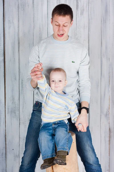 Father Plays His Little Happy Son Boy Smiles Indoor Photo — Stock Photo, Image