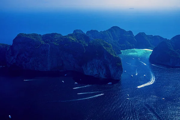 Aerial view of Phi-Phi island with Maya Bay and Pileh Lagoon. Krabi province, Thailand. Top view of isolated rocky tropical island with turquoise water and white beach.