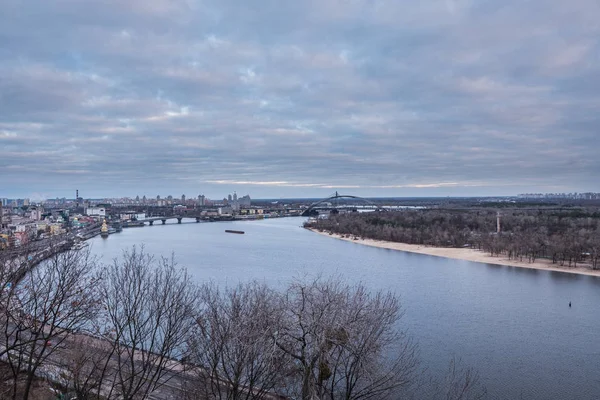 Kyiv, winter morning, beautiful view to the historical center Podol. Dnipro river, cloudy sky. High quality photo. — Stock Photo, Image