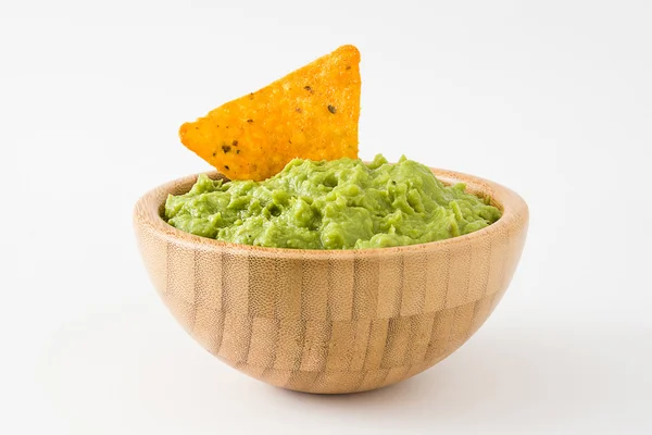 Guacamole in a wooden bowl — Stock Photo, Image