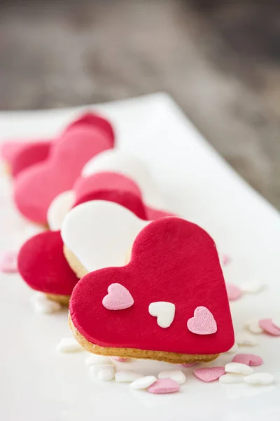 Valentine cookies with heart shape on wooden background — Stock Photo, Image