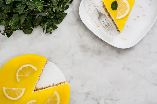 Lemon pie on white marble