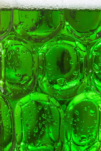 Cold green beer for Saint Patrick 's Day background.Closeup — стоковое фото