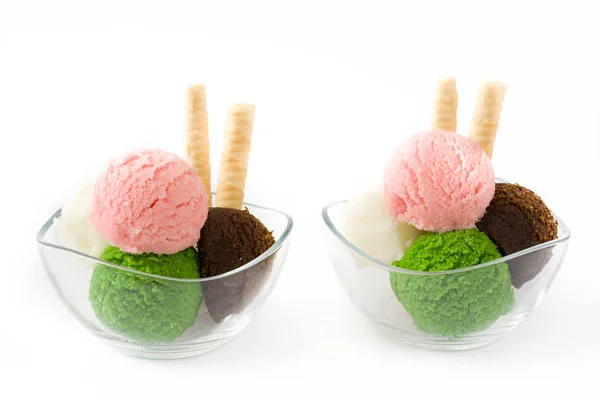 Ice cream scoops in crystal bowl, isolated on white background. Copyspace. — Stock Photo, Image