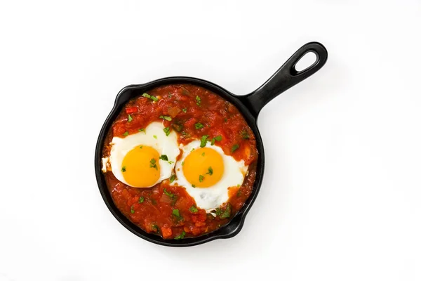 Mexican breakfast: Huevos rancheros in iron frying pan isolated on white background — Stock Photo, Image