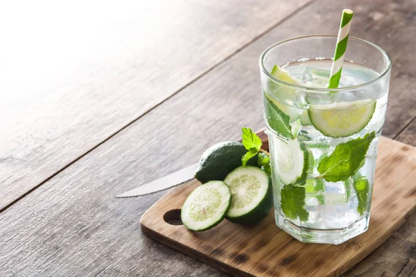 Mojito cocktail in glass on wooden table — Stock Photo, Image