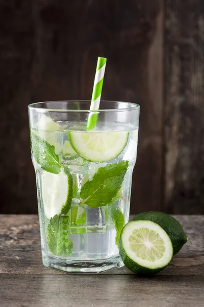 Mojito cocktail in glass on wooden table — Stock Photo, Image