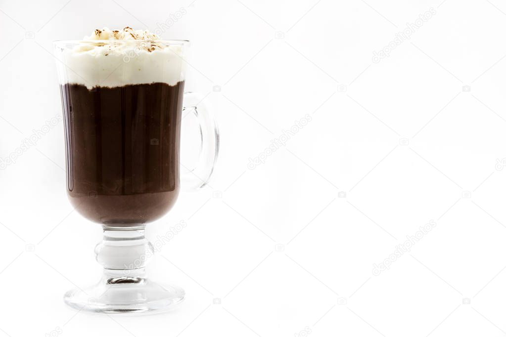 Irish coffee in glass isolated on white background