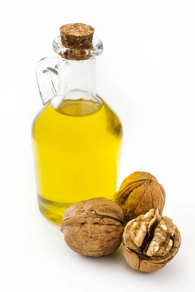 Walnuts oil isolated on white background — Stock Photo, Image