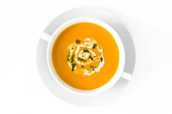 Pumpkin soup in white bowl isolated on white background — Stock Photo, Image