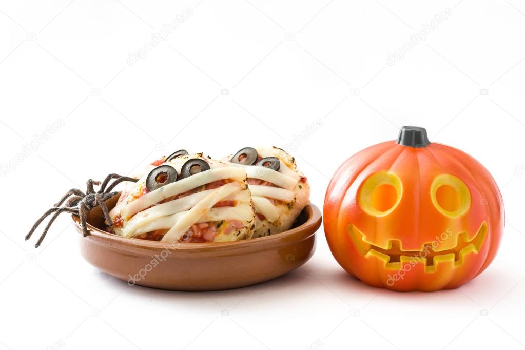 Halloween mummies mini pizzas and halloween pumpkin isolated on white background