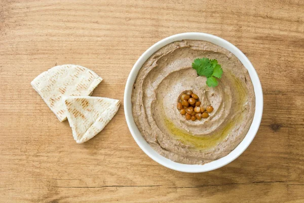 Mercimek humus ahşap kase. Üstten Görünüm 