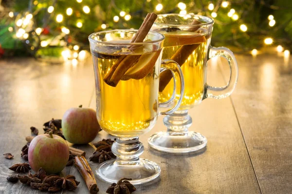 Mulled cider in glass on wooden table. — Stock Photo, Image
