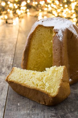 Pandoro Noel Kek ile şeker ve Noel ışık ahşap tablo