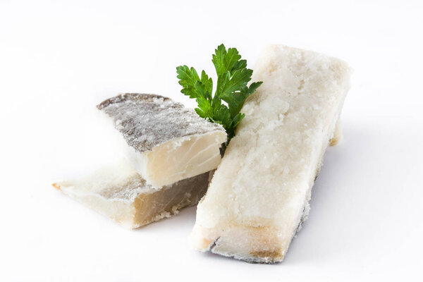 Salted dried cod isolated on white background. Typical Easter food