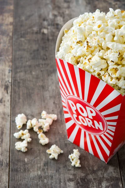 Popcorn Packaging Striped Wooden Table Background Copyspace — Stock Photo, Image