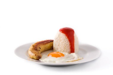 Kübalı Arroz. Tipik Küba pilavı, yanında muz ve kızarmış yumurta.