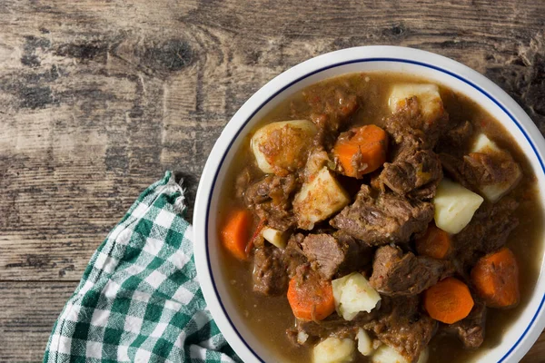 Irish Beef Stew Carrots Potatoes Wooden Table Top View Copy — Stock Photo, Image