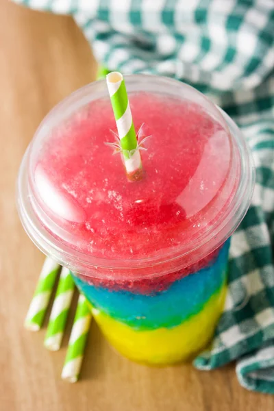 Colorful Slushie Differents Flavors Straw Plastic Cup Wooden Table — Stock Photo, Image